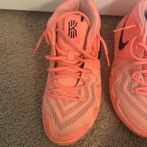 Selling bright salmon colored kyrie Nike shoes with free shirt
